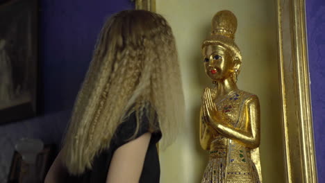 kid discovers a golden statue of buddha