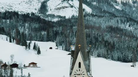 snowy alpine church tower