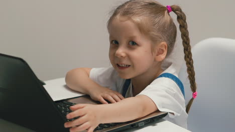 closeup-portrait-of-little-cute-girl-with-pigtails