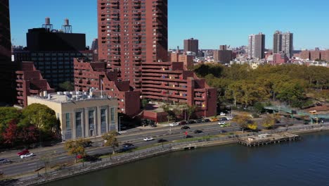Drone-turn-towards-apartment-highrise-buildings-in-Harlem,-Manhattan,-NYC