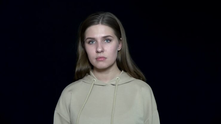 Young woman texting on a smartphone