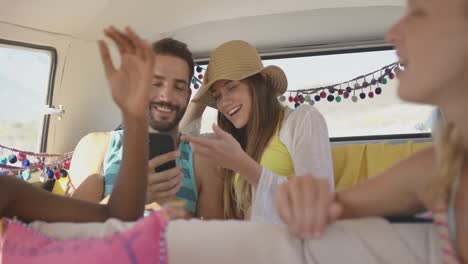 young adult friends in a camper van 4k