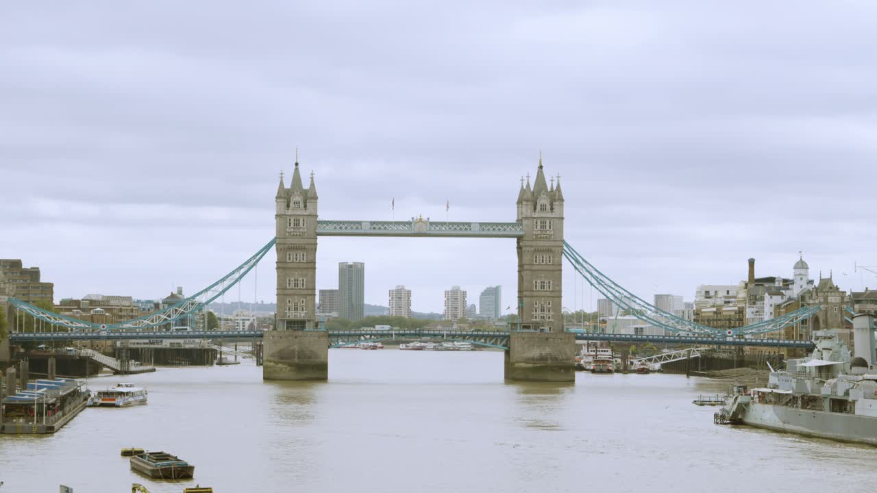 London Bridge landmark over the Thames in central London against a cloudy sky