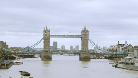 london bridge landmark over the thames in central london against a cloudy sky