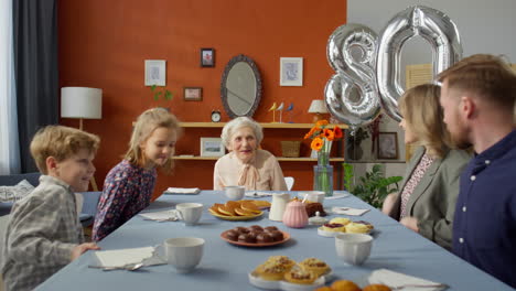 family gathering for grandma birthday dinner