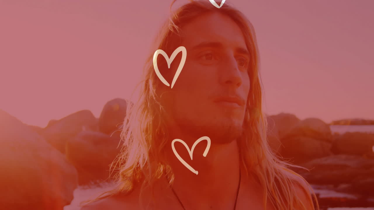 сердца анимация над человеком с длинными волосами на открытом воздухе