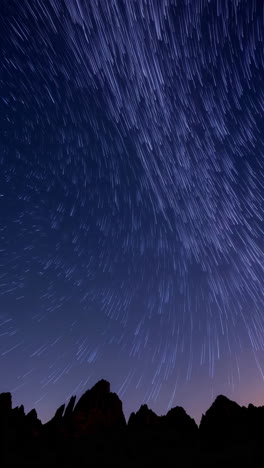 star trails over mountains