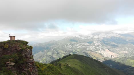 drone landscape of asturias countryside, mountainous skyline and lush greenery flying above peaks of europe