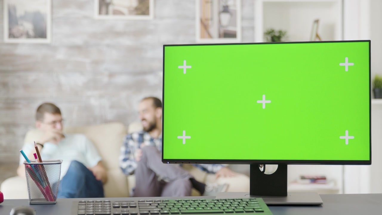 Computer Monitor with Green Screen in Modern Home Office