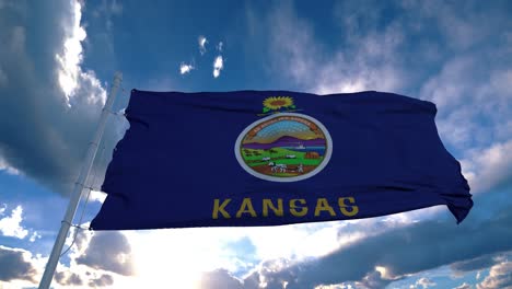 kansas flag on a flagpole waving in the wind in the sky. state of kansas in the united states of america