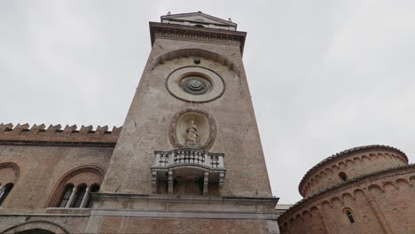 vintage architecture of palazzo della ragione clock tower in mantova, lombardy italy. low angle