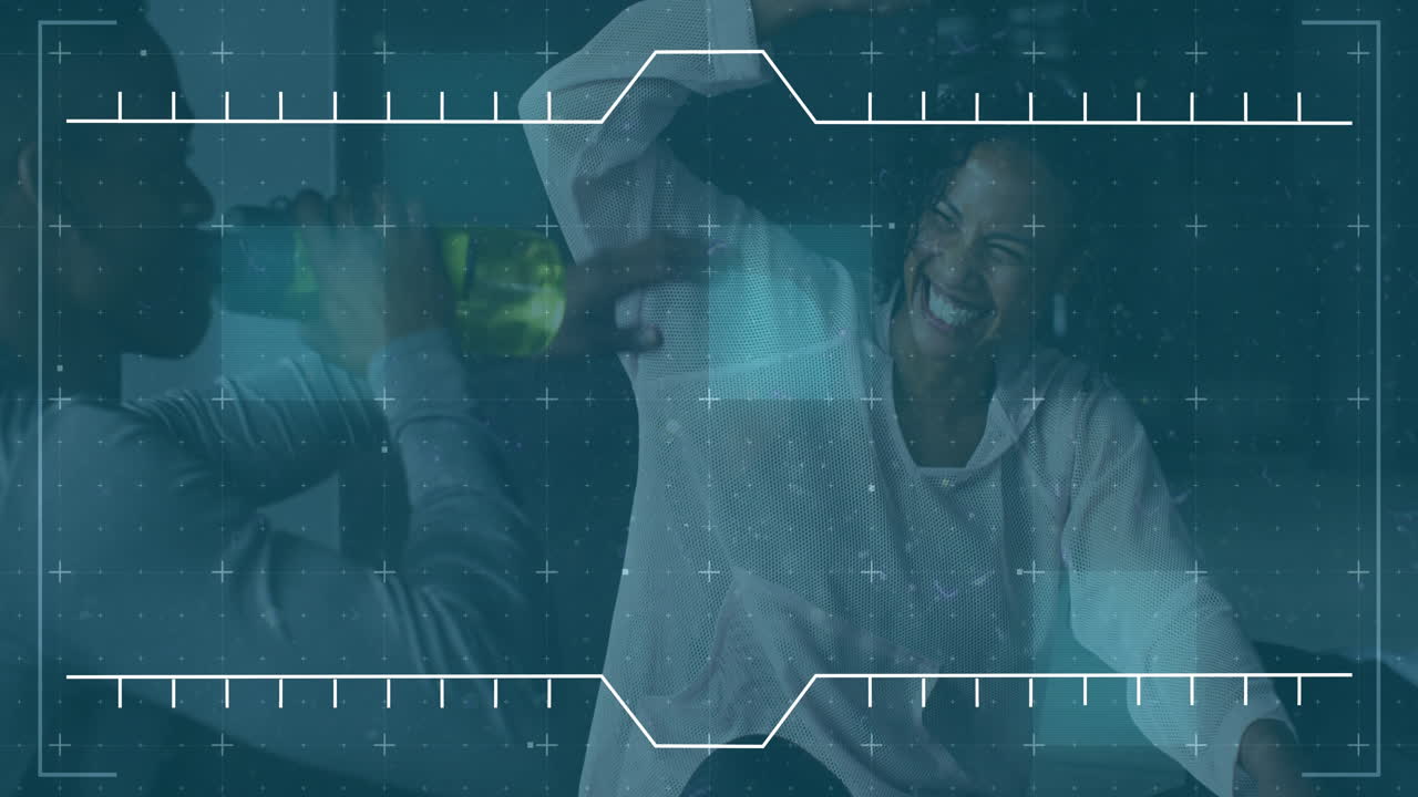 Animation of data processing over man and woman high fiving taking break during exercise