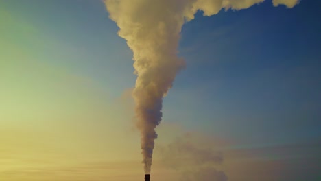 smoke stack emissions at sunrise/sunset