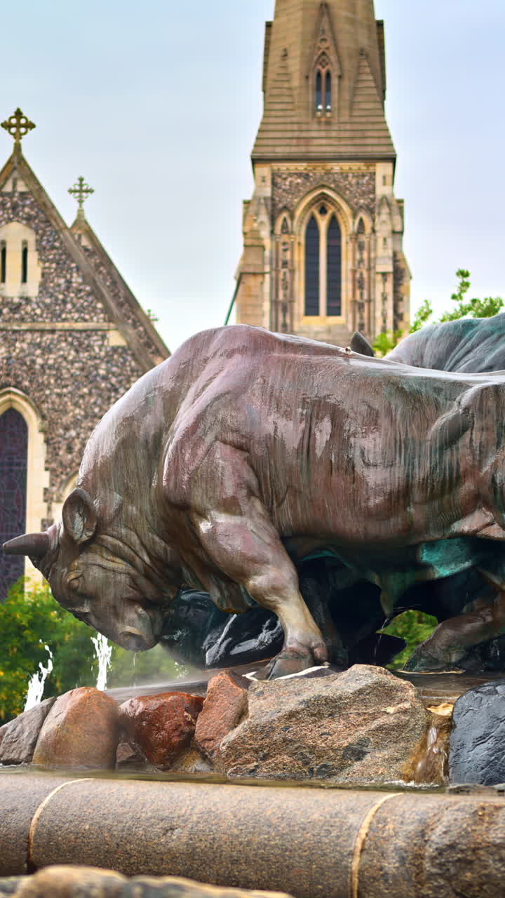 Close up of the Gefion Fountain in front of St Alban's Church in Copenhagen, Denmark. Vertical