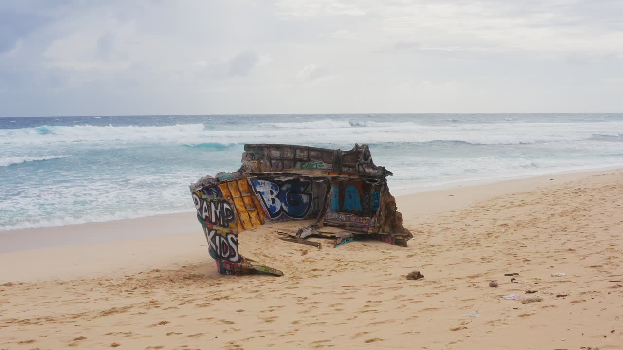 Aerial Fly Over of Shipwreck on Beach in Uluwatu, Bali, Indonesia. 4K Drone