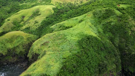 lush green headlands of baras, catanduanes, philippines - aerial drone shot