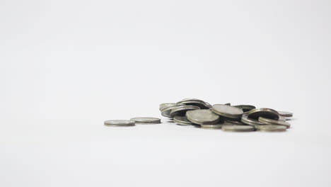 A-bunch-of-Indian-old-five-Rupees-coin-on-white-background-I-Indian-currency