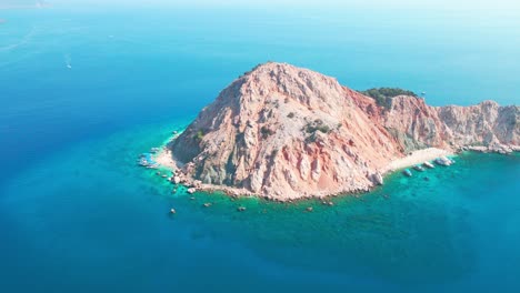 Aerial-4K-drone-view-of-Suluada-Island-in-Adrasan-Sea,-Antalya-–-Turkey