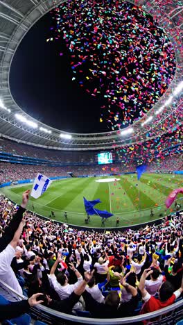 wide-angle video captures a vibrant stadium celebration with confetti raining down