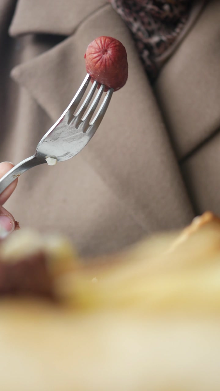 Close-up of a Mini Sausage on a Fork