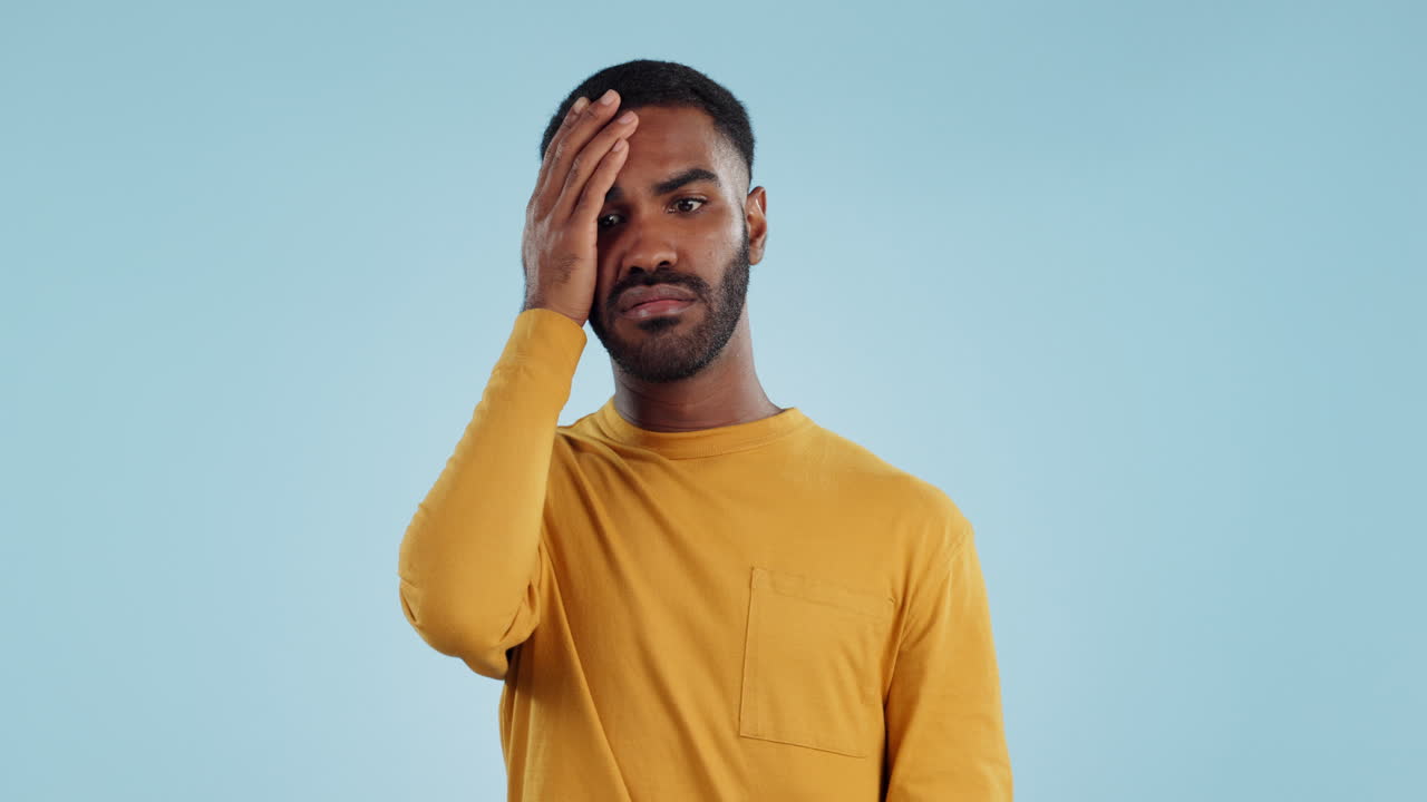 Stress, fail and man in studio with facepalm emoji