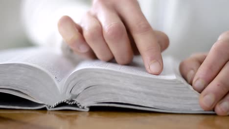 praying-to-god-with-bible-on-white-background-with-people-stock-video-stock-footage