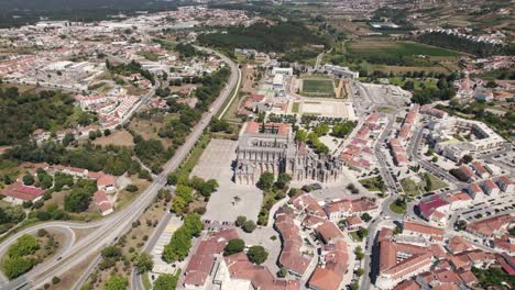 aerial panoramic view over batalha monastery and surrounding landscape, portugal