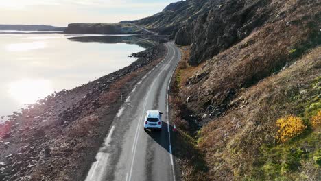 ICELAND-VOLCANO-mountain-road-view-with-car-4K-Drone-Footage