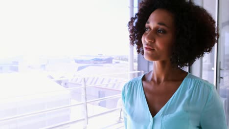 Thoughtful-woman-having-a-cup-of-coffee-4k