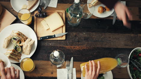 group meal at a wooden table