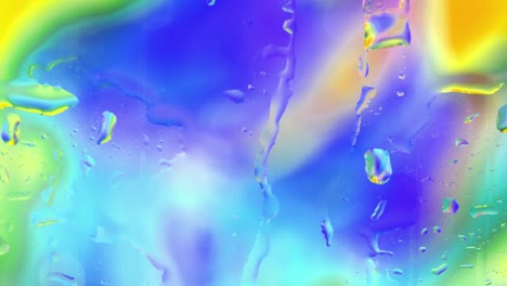 agua colorida lisa en la superficie del vidrio