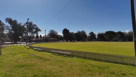 wide outdoor sports field under clear blue sky