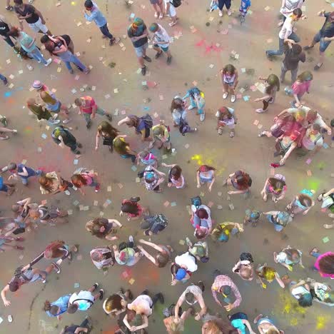 summer outdoor festival. vinnitsa, ukraine - july 2017: young people covered with coloured powder during summer outdoor festival