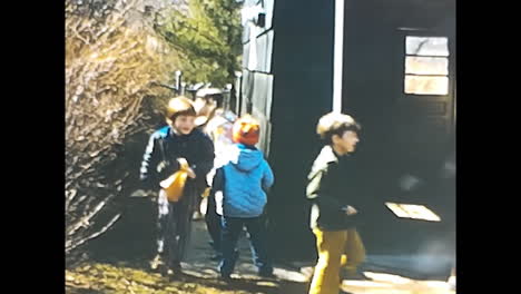 group of young boys standing together. circa usa - 1970s: a video from a 1970s archive capturing a group of young boys standing next to each other in the usa.