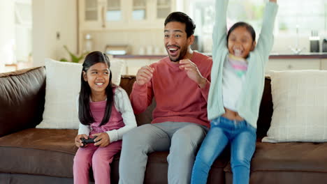 Dad,-children-gaming-and-winning-a-video-game