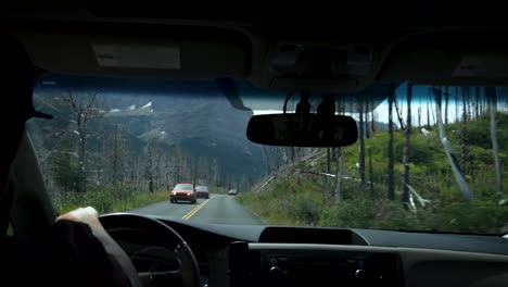 back seat shot threw the windshield of a dope mountain.