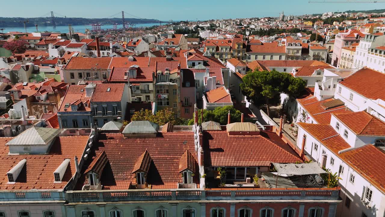Lisbon Cityscape with Red Roofs and Bridge