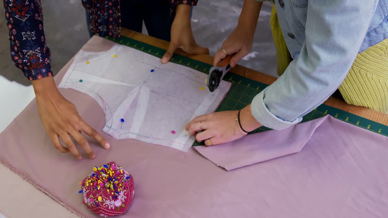 Fashion designers working in fashion studio 4k