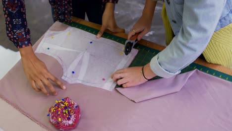 fashion designers working in fashion studio 4k
