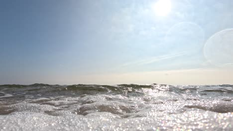 waves crashing on the sandy shore