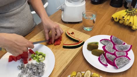 preparing a tropical fruit smoothie