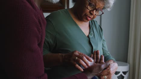 A-senior-African-american-couple-spending-time-together-at-home.-Social-distancing-in-quarantine.