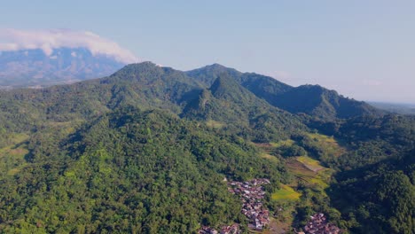 Characteristic-aerial-scenery-of-tropical-landscape,-village,-plantation,-forest-and-hills