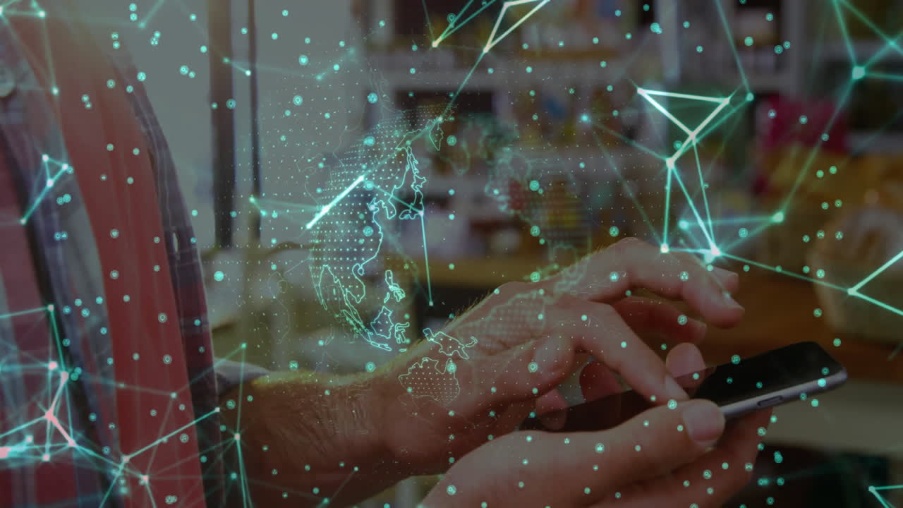 animación de la red de conexiones y el globo sobre el hombre caucásico usando teléfono inteligente