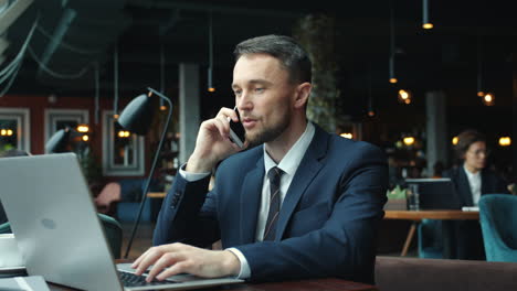 businessman working in a cafe