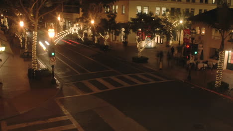 night time lapse of state street during the holidays in santa barbara california