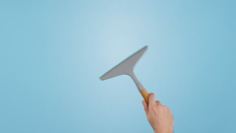 window, cleaning and janitor hand washing glass