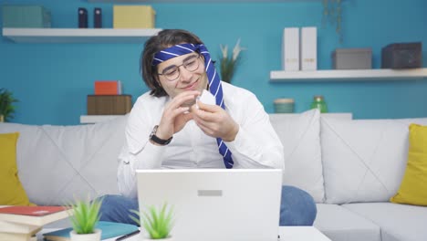 Funny-man-playing-with-paper-airplane-while-doing-business.