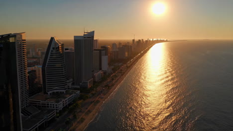 sunset over coastal city