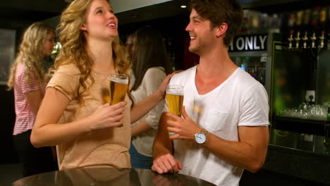 cute friends having a beer